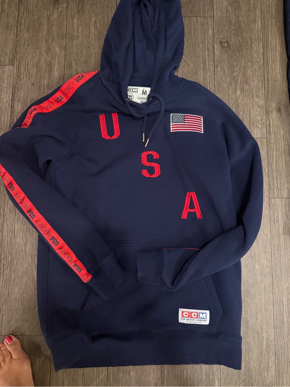 CCM Navy Hoodie with Red USA Lettering and Flag Patch